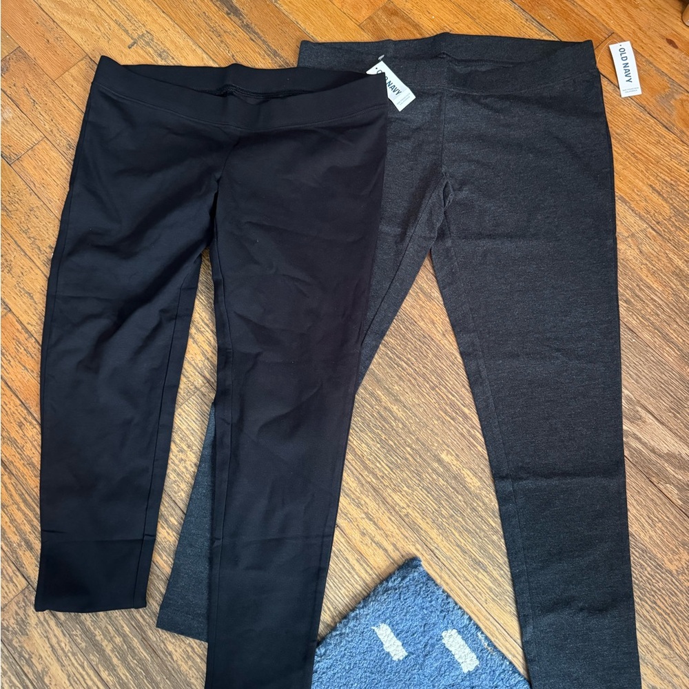 Two NWT Old Navy maternity leggings. One black, one dark grey.
